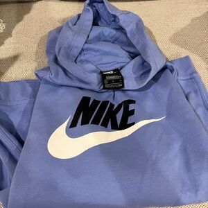 Kids Nike Light Blue Hoodie with Black Logo. Size XL